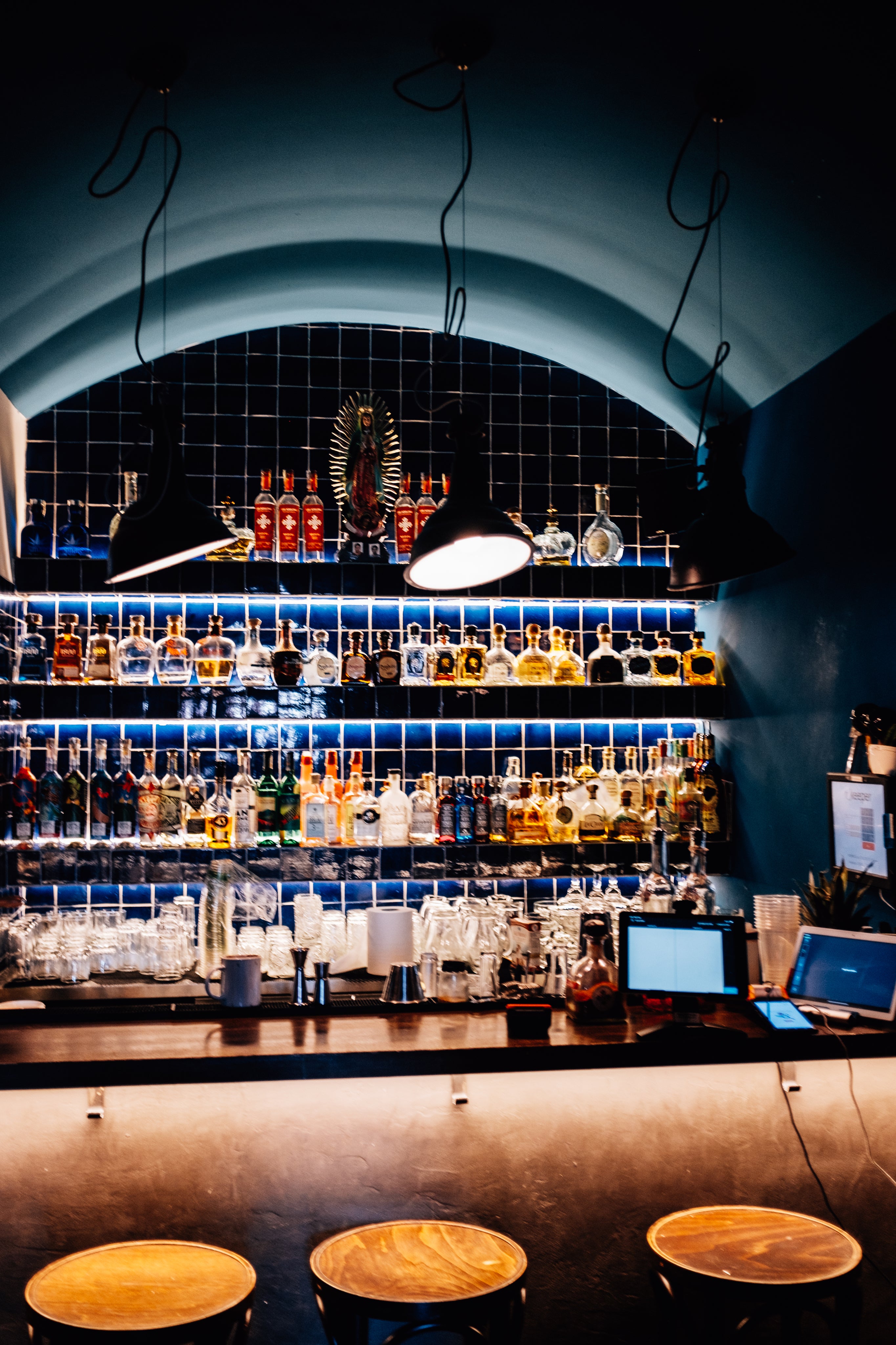 Cocktails on tap backlit bar